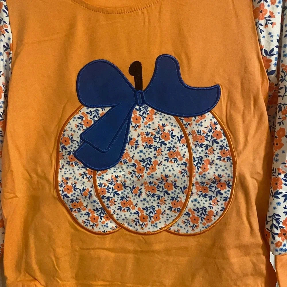 N/A sleeve orange appliqué